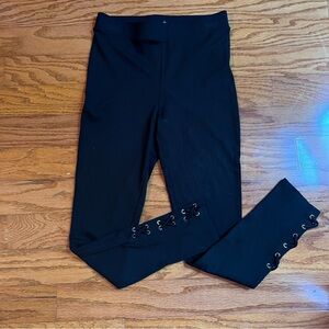 Forever 21 size medium black leggings with ties.